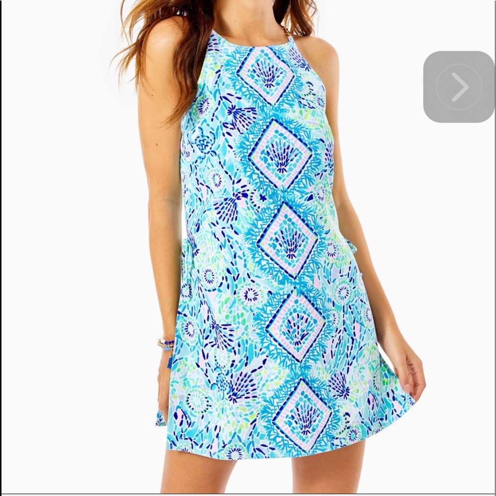 Beautiful Lilly romper with shorts under . Super nice fabric.